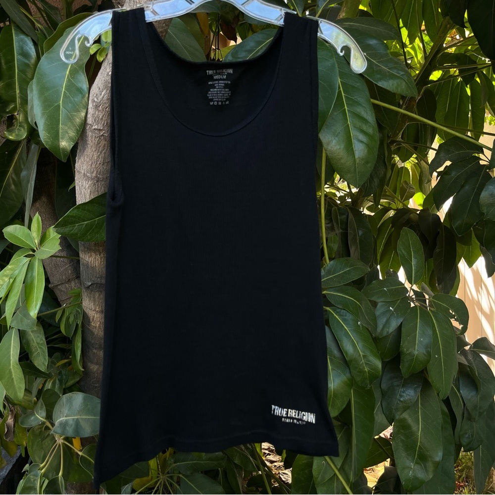 True Religion black ribbed tank top with a silver logo on the bottom.